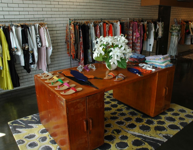 Vintage desk and women's clothes inside Easton Pearson shop in Brisbane
