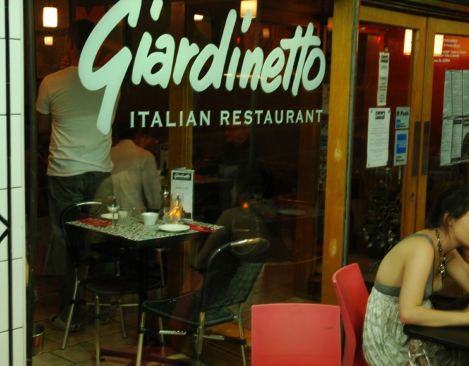 People dining on footpath outside Giardinetto Restaurant Fortitude Valley