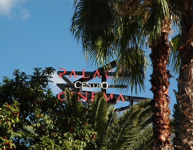 Palace Centro Cinemas sign surrounded by palm trees in Fortitude Valley on James St.