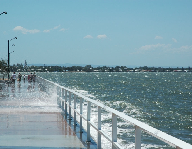 People walking along Shorncliffe boardwalk