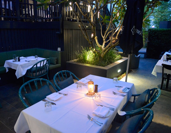 Court yard dining area with frangipani tree