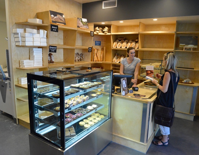 Customer standing inside Christian Jacques bakery