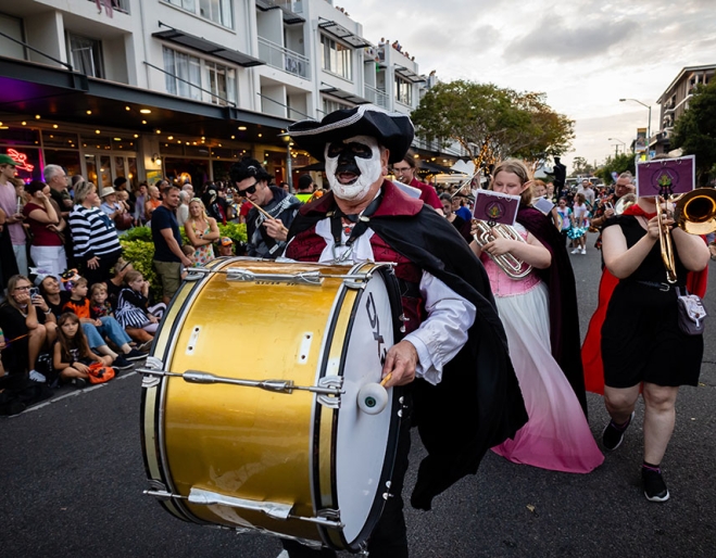 People in street parade Wynnum