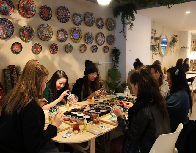 A group of people doing art at ART MASTERCLASS 