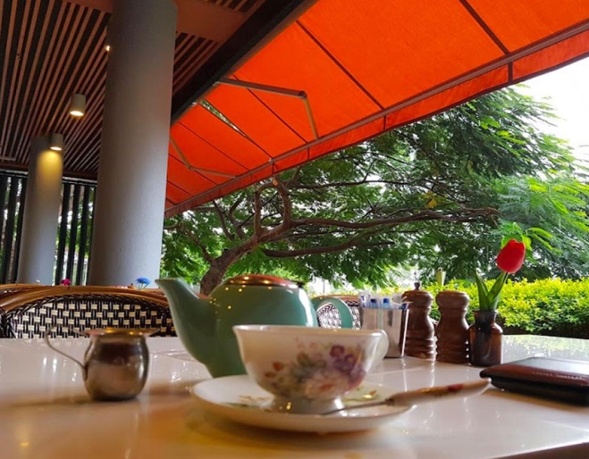 Cup of coffee on table at Bliss on Riverside