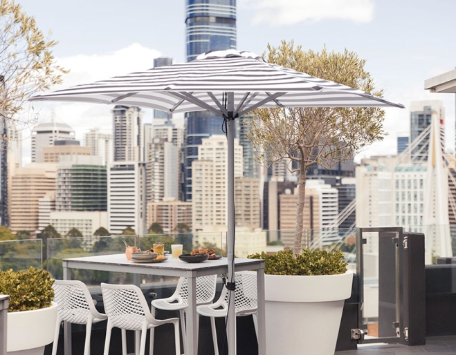 Table and unbrella on terrace at Eagles Nest Kangaroo Point