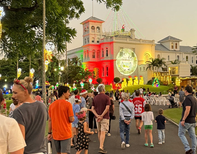 people walking up to Government House