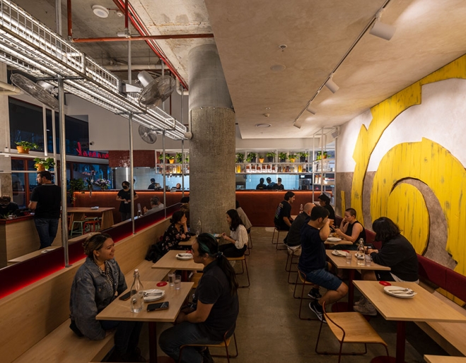 People dining inside Mamak Malaysian Roti & Satay Brisbane CBD