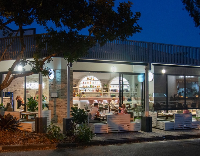 Exterior lit up corner of Mede restaurant, Bulimba
