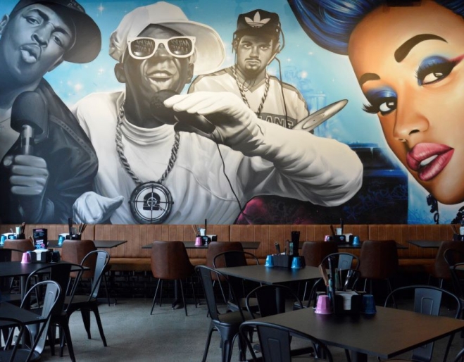 Murals on walls at Milky Lane Newstead