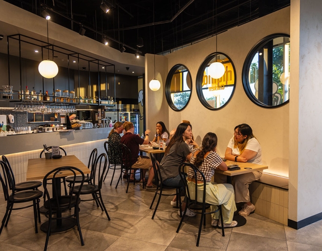 People dining at Momo Chicken Newmarket