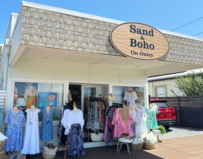 Exterior of Sand & Boho on Oxley, Scarborough with racks of dresses outside