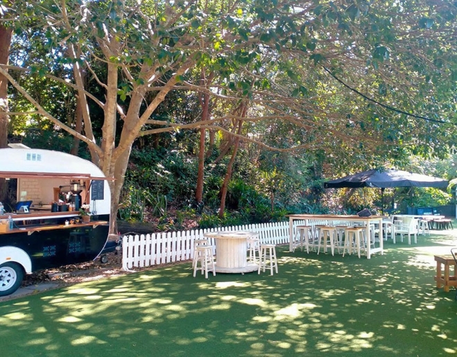 Crepe caravan at edge of garden at The Secret Garden Ferny Hills