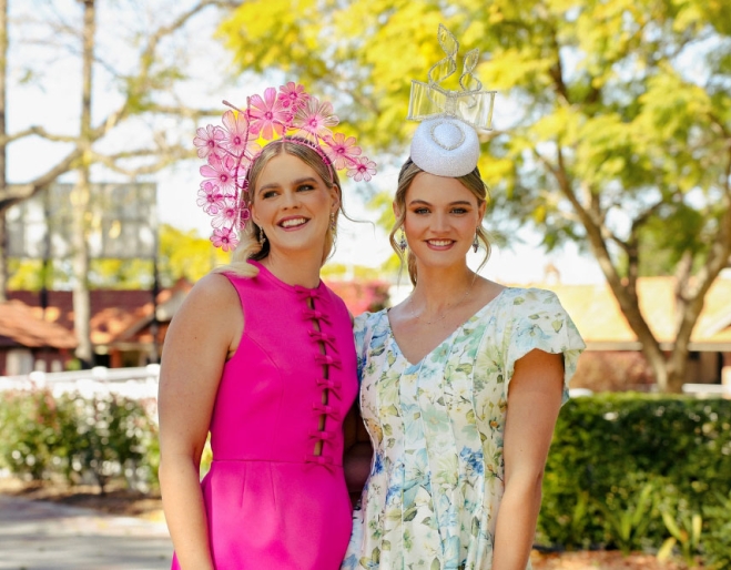 Women in dresses and hats Ladbrokes Spring Racing Carnival