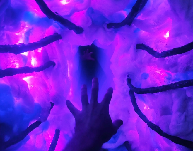 Hands under lights at Project Immersive