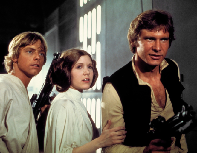 Three people standing in sci-fi movie 