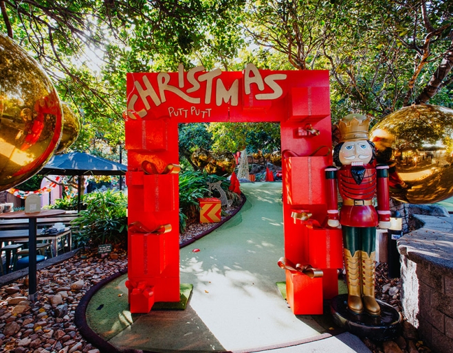Red entry to Christmas Putt Putt