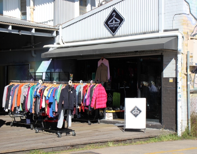 Exterior of Vintage Street, Stones Corner with racks of clothing outside