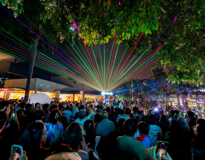 People watching laser light show