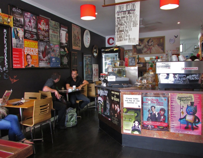 Counter and seating inside hHallowed Grounds Café