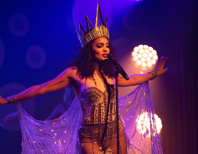 Performer on stage at Blanc de Blanc Encore West End