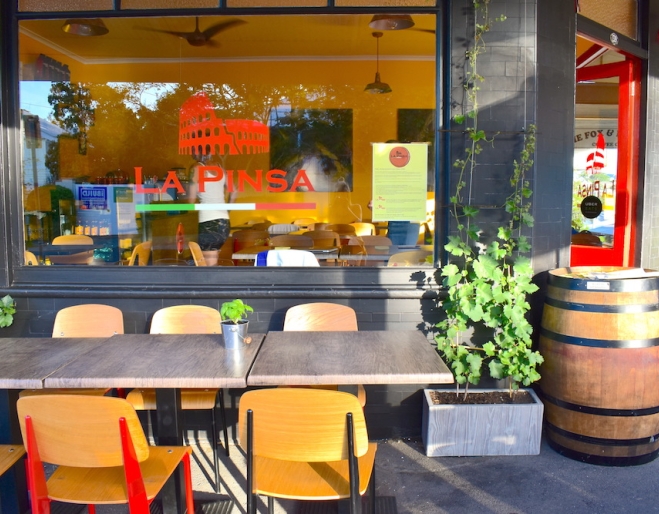 Tables and bar in La Pinsa Paddington
