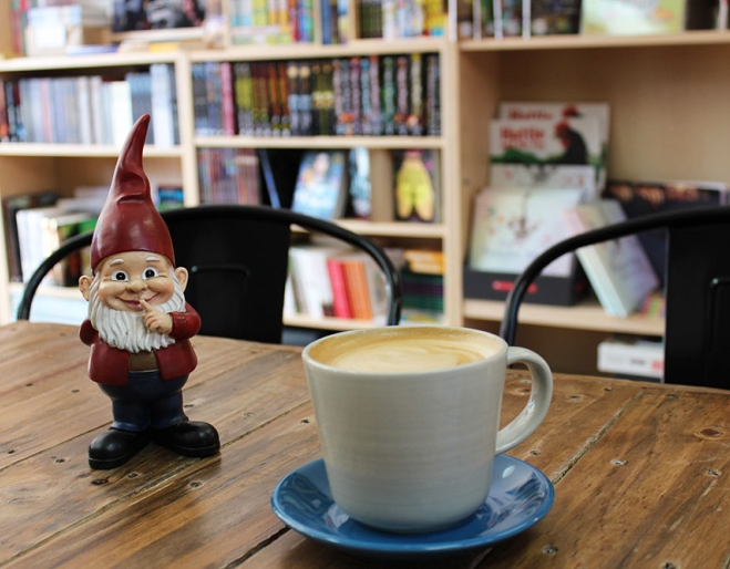 Gnome and coffee cup on table at Little Gnome Wynnum