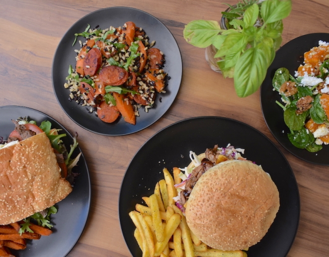 Food on four plates at Mad Kitchen & Co Bowen Hills
