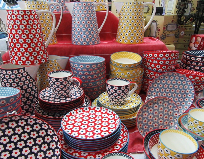 Colourful jugs and crockery inside Marcia's on Montague West End