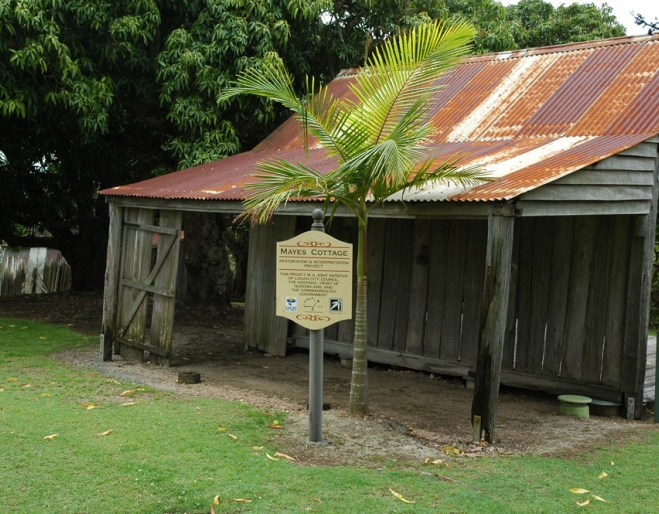 Rusty roof on settlers cottage called Mayes Cottage in Kingston.