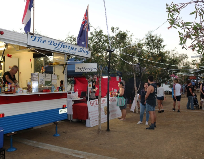 Poeple at food stall Yarrabilba’s Mingle Markets 