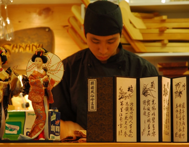 Japanese waiter inside Sakana restaurant in Clayfield 