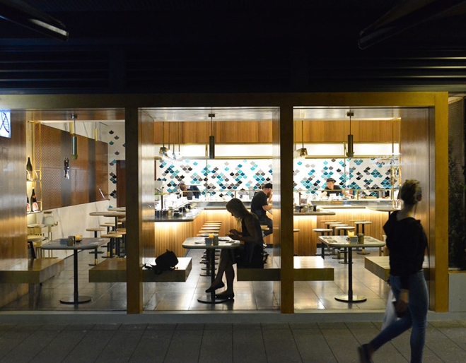 Exterior lit up by night Sushi & Nori; Nori Bowen Hills