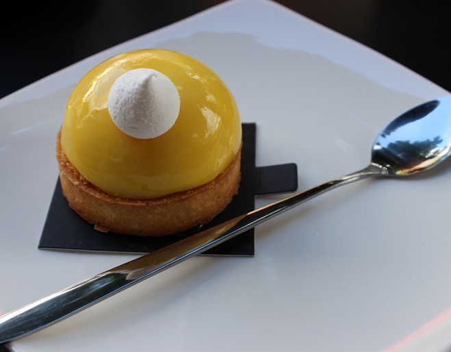 Passionfruit Almond Tart with a miniature meringue on top at The Whisk Fine Patisserie Upper Mt Gravatt 