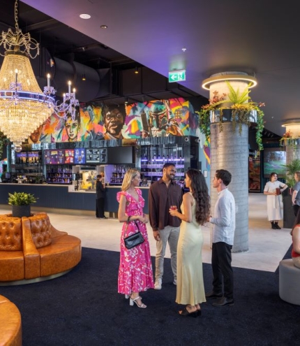 People standing inside the foyer of Angelika Cinemas 