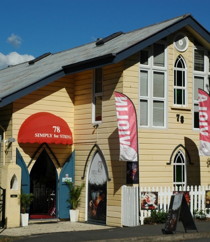 Old church building housing Simply for Strings Red Hill