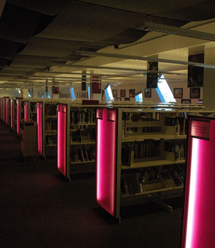 Aisles of books inside the Brisbane Square Library 