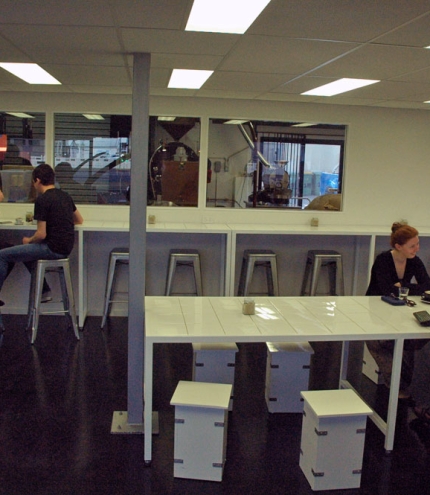 People sipping coffee in cafe section of Cleanskin Co Roastery in Brendale