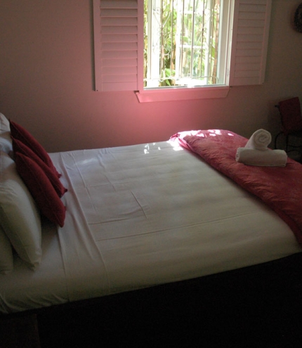 Double bed inside Edward Lodge in Brisbane's New Farm