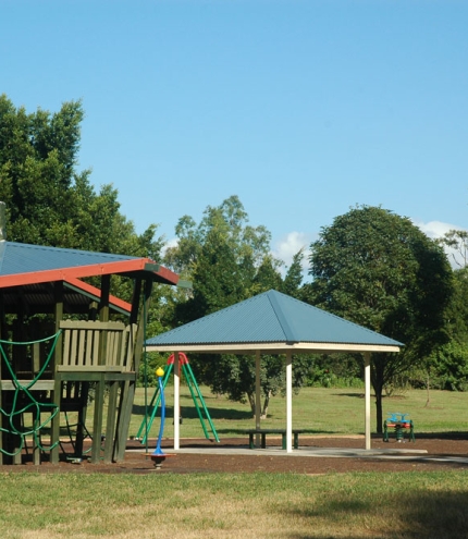 Playground equipment and fort inside Faulkner Park Graceville