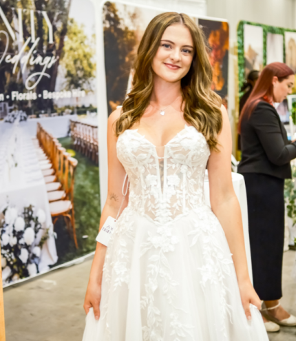 Girl posing in a wedding dress Brisbane's Annual Wedding Expo