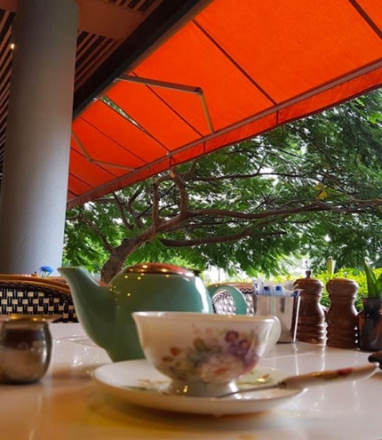 Cup of coffee on table at Bliss on Riverside