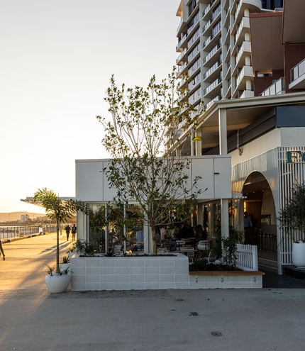 Exterior of Fosh restaurant overlooking river at Portside Wharf, Hamilton