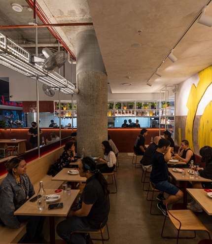 People dining inside Mamak Malaysian Roti & Satay Brisbane CBD