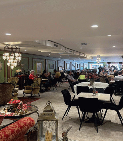 Tables and chairs inside Pera Palace Wynnum