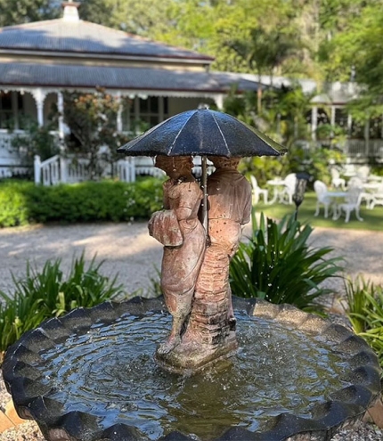 Garden statue in front ot Bonappatea