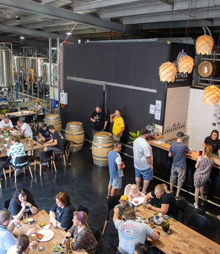 People congregating inside Aether Brewing Northgate