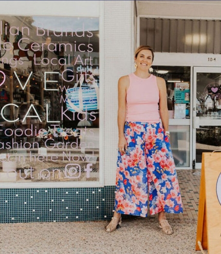 Woman standing outside The Collective Store, Wynnum
