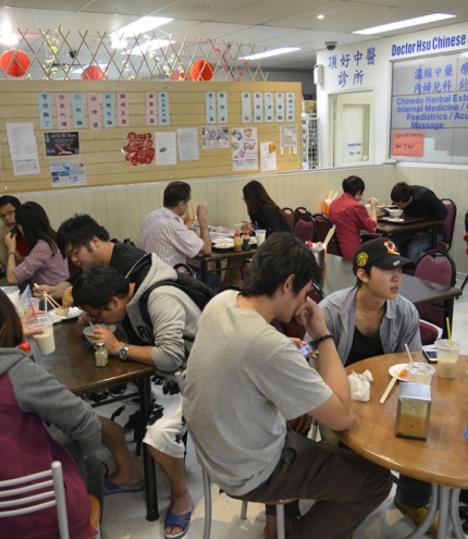Chinese diners inside Happy Hours Tea Bar 