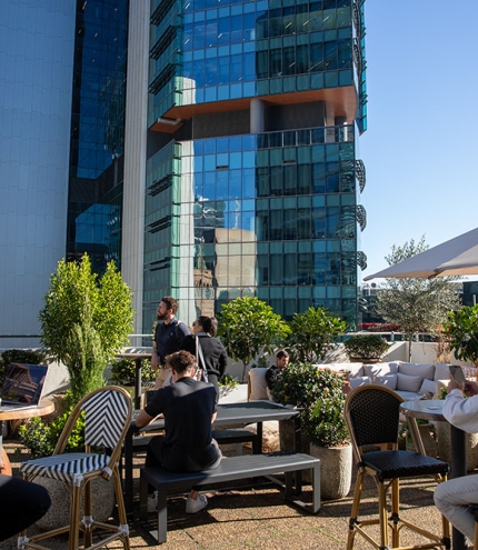People seated at Raise Rooftop Brisbane CBD